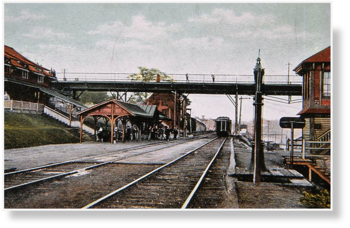 Phoenixville station and tower overlooking the iron and steel complex ca. 1910